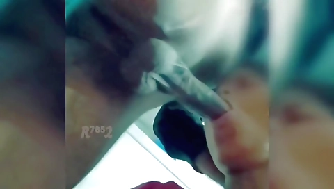 Indian brunette with big cock is deepthroating on camera