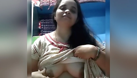 Indian brunette shows her huge boobies on webcam video
