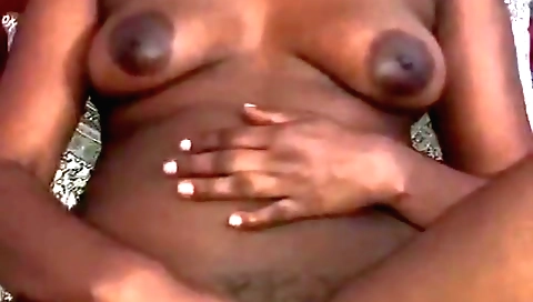 Busty brunette fingering her shaved pussy in hd video