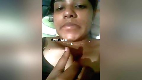 Busty brunette shows off her ass and cums on webcam