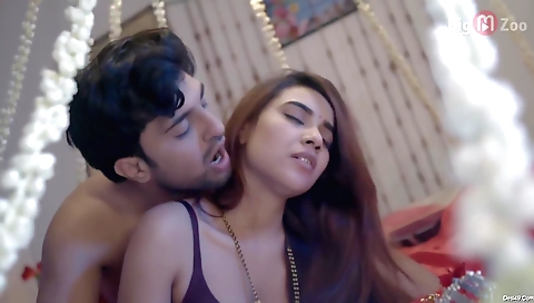 Hot brunette babe in a black trench coat and a sexy dress