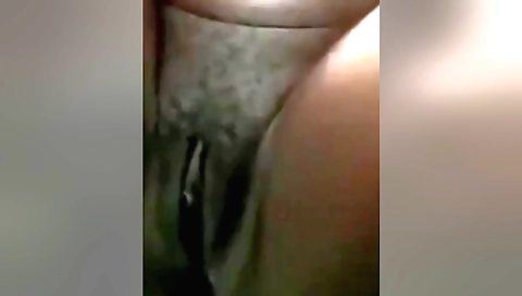 Indian hairy amateur solo girl masturbates in the bedroom