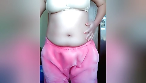 Round booty brunette with a big boobed ass masturbating