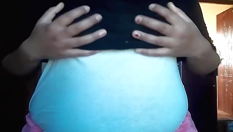 Busty indian teen is on her knees in front of a mirror