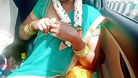 Indian girl in a red and black dress is talking to a stranger