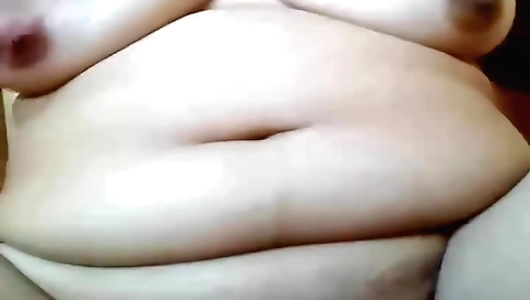 Busty chick is showing off her hairy pussy and tits