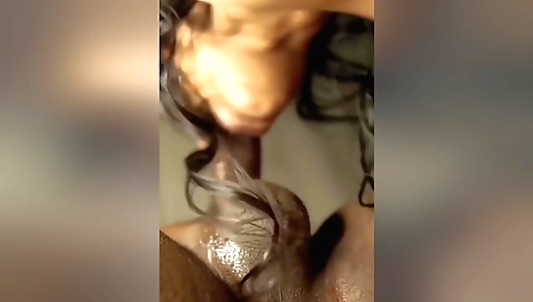 Brunette teen in a black blouse fucks her hairy pussy