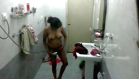 Indian milf with natural boobs enjoys the sensual shower
