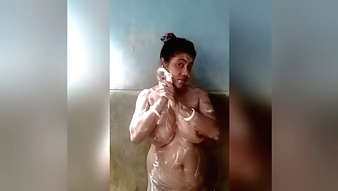 Busty indian brunette is showing off her body in the web camera