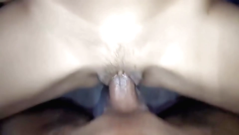 Indian girl with a white towel on her back watching