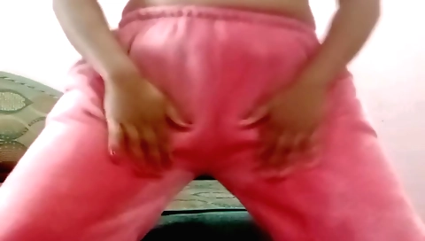 Sexy brunette is having fun in her bedroom with cam