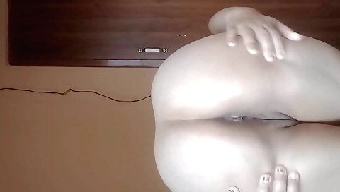 A sexy chick with nice tits is fingering her pussy