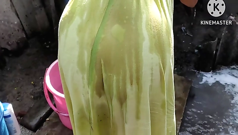 Solo female with a large nude body in a nude outdoor bath