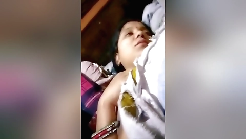 Sexy brunette enjoys a solo night fucking with a webcam