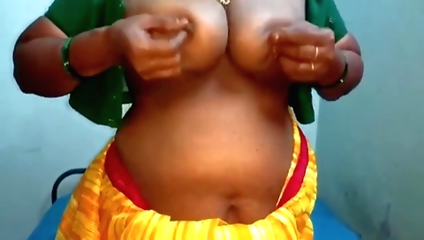 Bhabhi masturbates and rides a dildo with big boobs