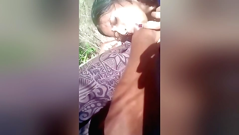 Indian girlfriend getting her feet slapped outdoors
