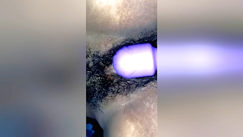 Indian amateur cuntie uses a dildo in her hairy pussy